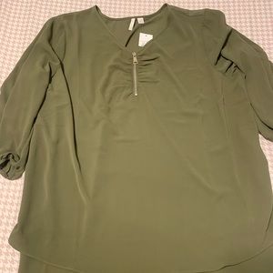 NWT. Cato Est 1946 olive green top with zipper detail. 3/4 sleeves. Size 18/20.